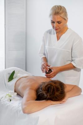woman-spending-time-spa-getting-exfoliation-massage_23-2149871906.jpg